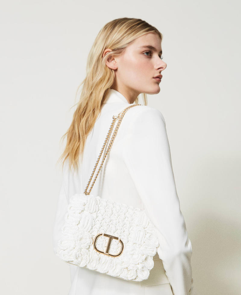 Shoulder bag with crochet embroidery