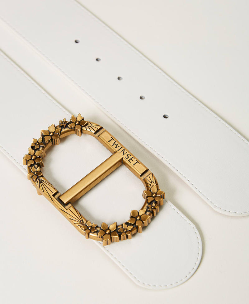 Belt with floral Oval T buckle