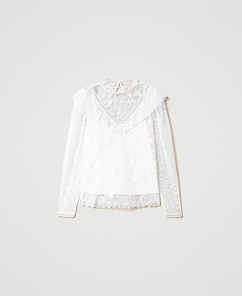 Blusa in rete con ricamo a mano