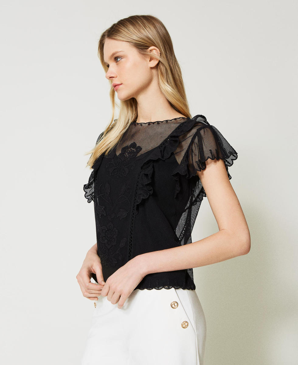 Mesh top with handmade embroidery