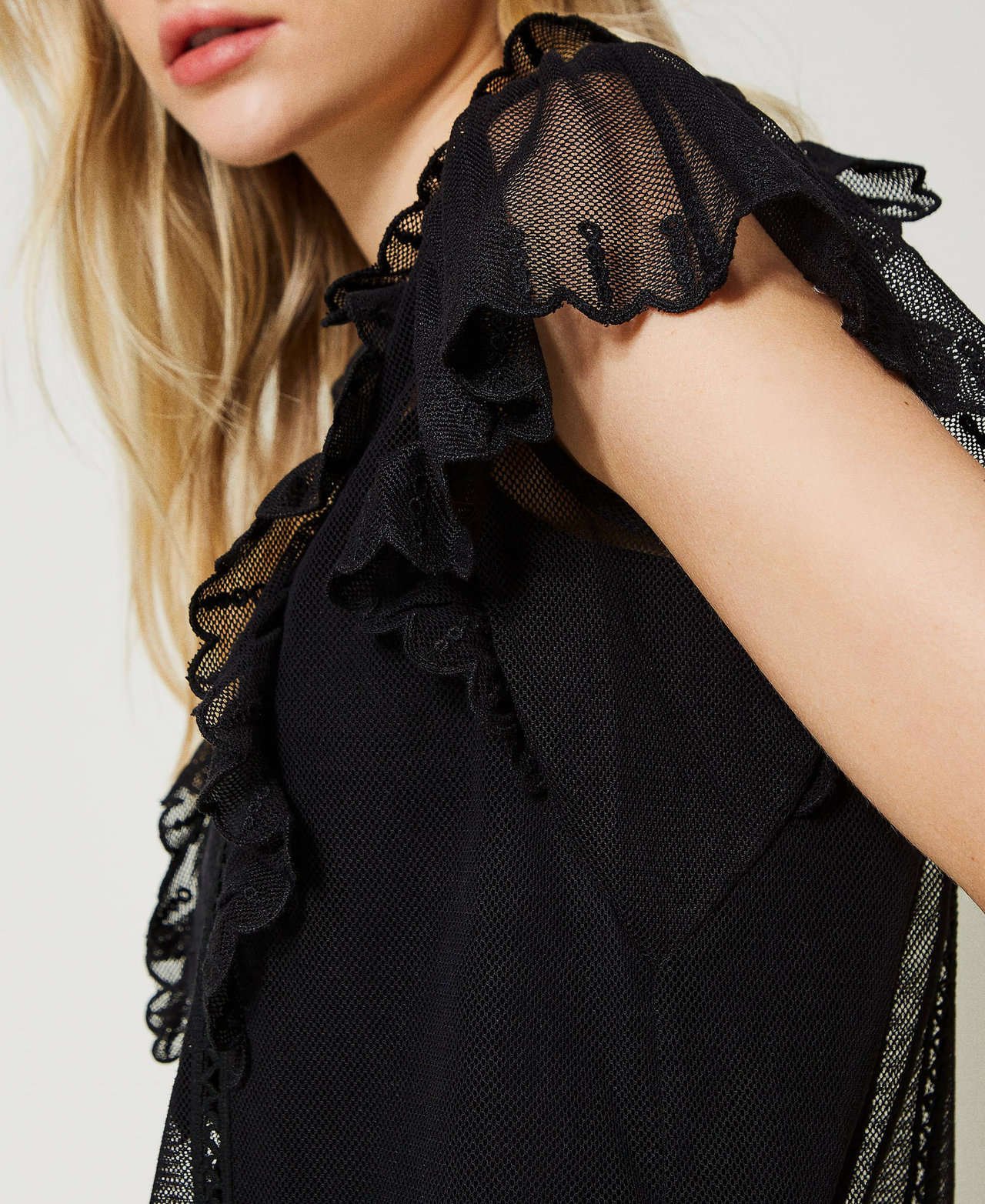 Mesh top with handmade embroidery