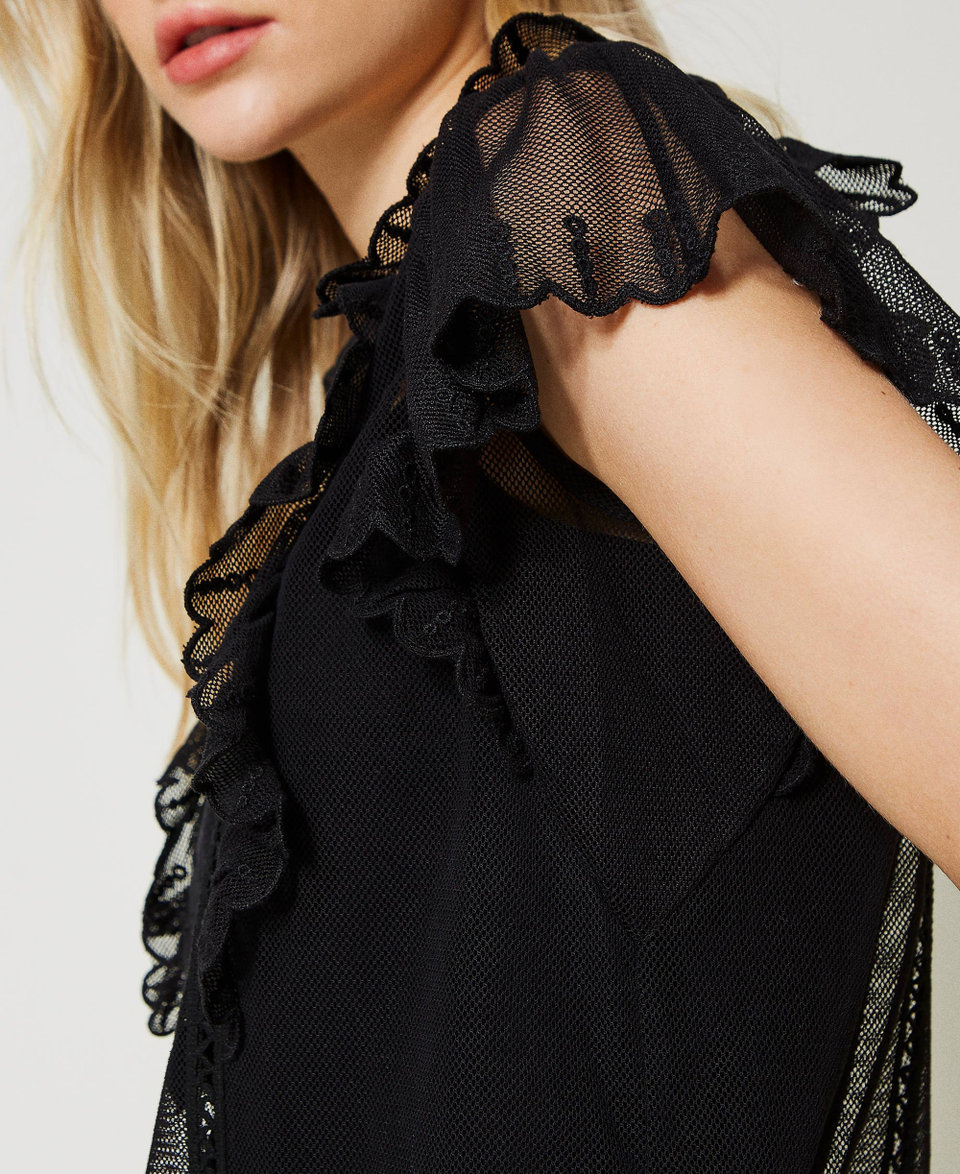 Top in rete con ricamo a mano