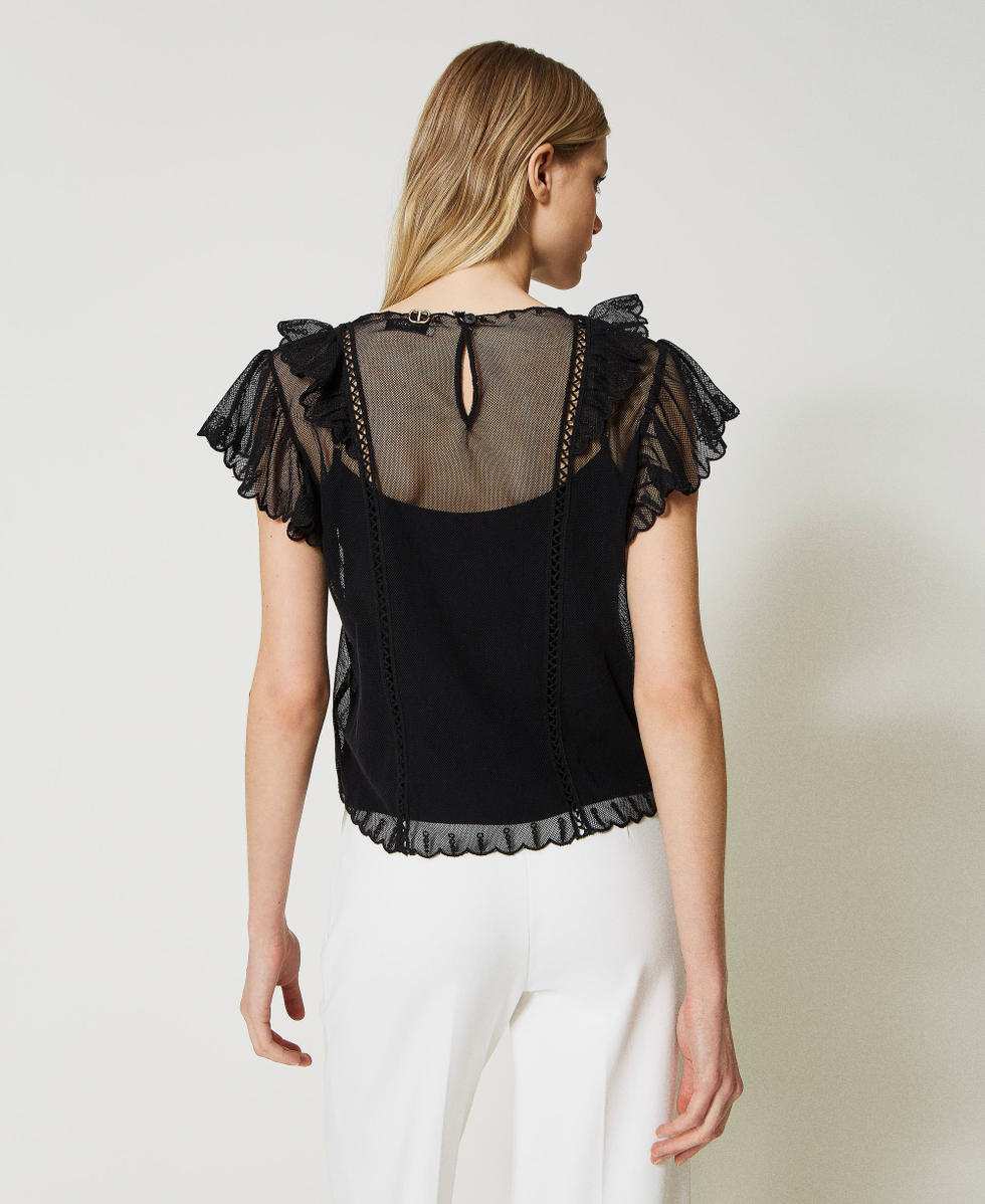 Mesh top with handmade embroidery