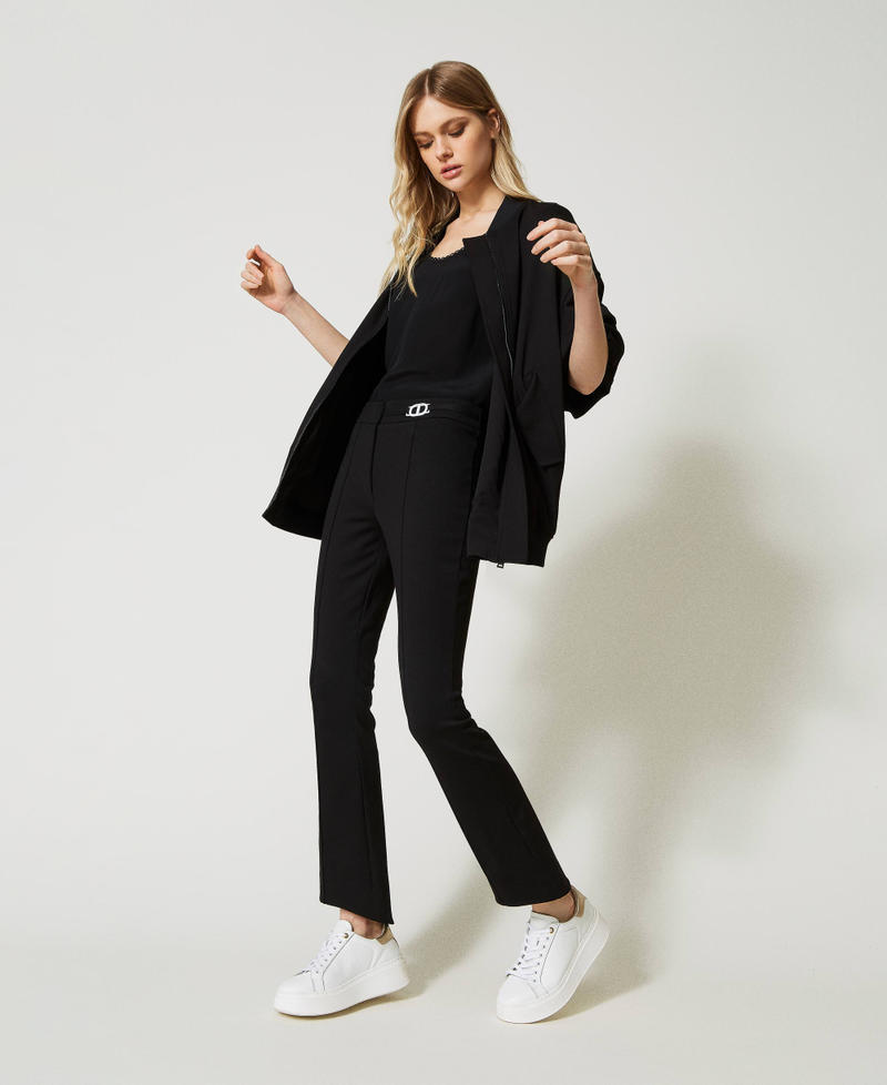 Pantalon avec boucle Oval T