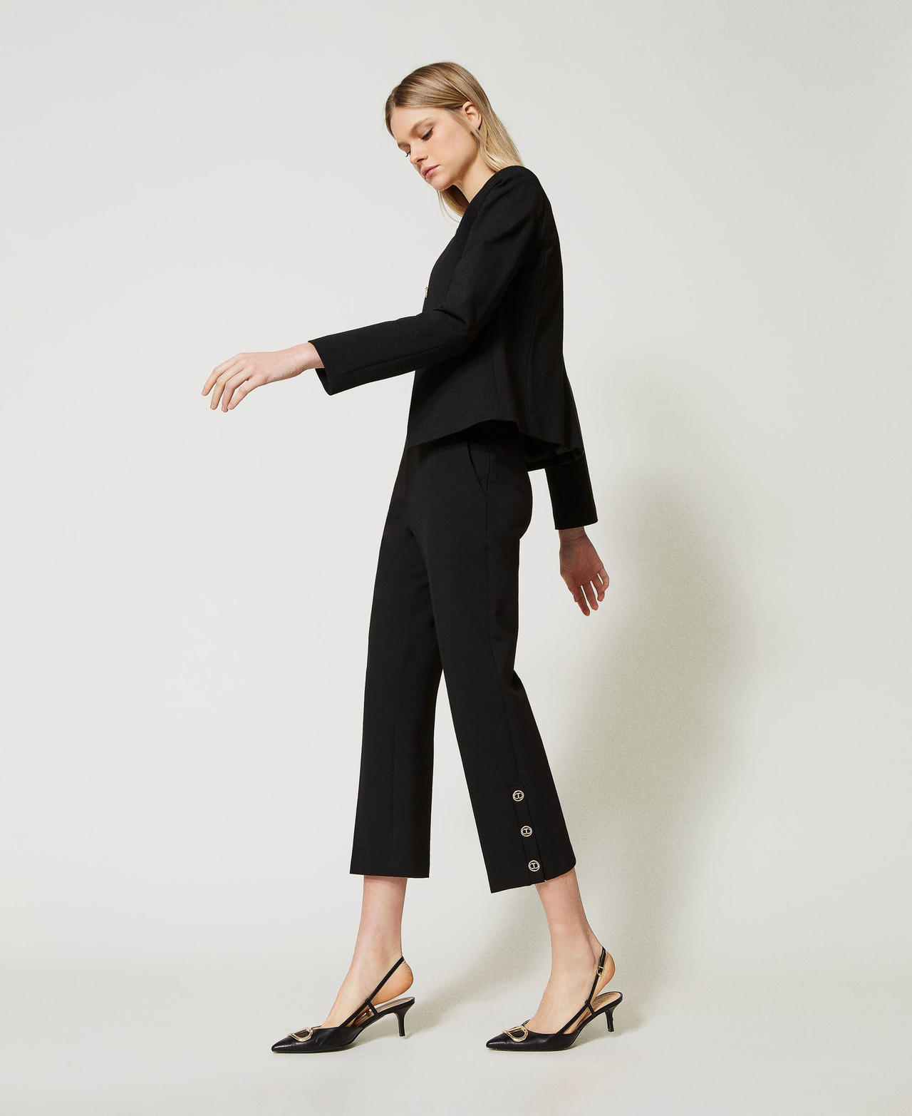 Cropped trousers with Oval T buttons