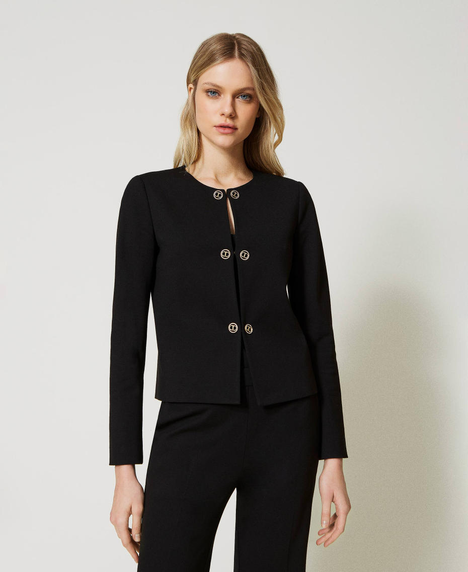 Short blazer with Oval T button