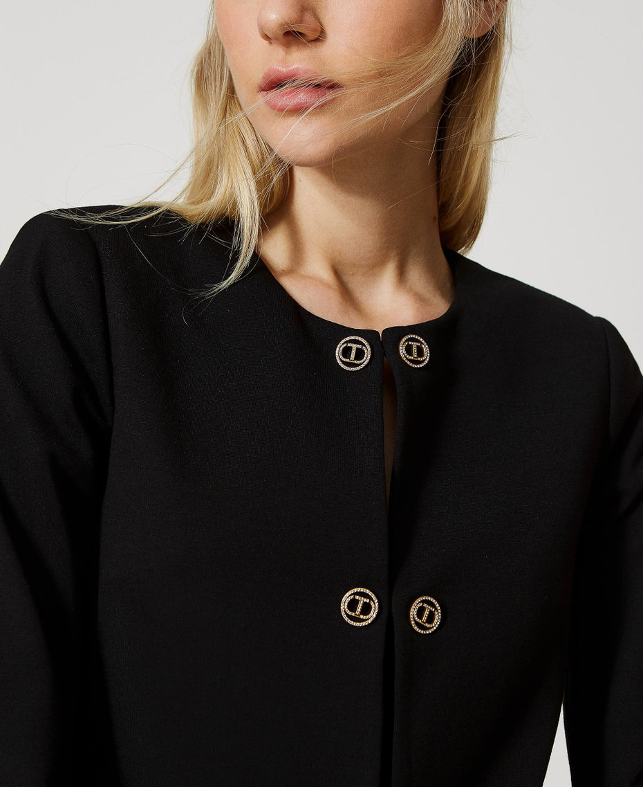 Short blazer with Oval T button