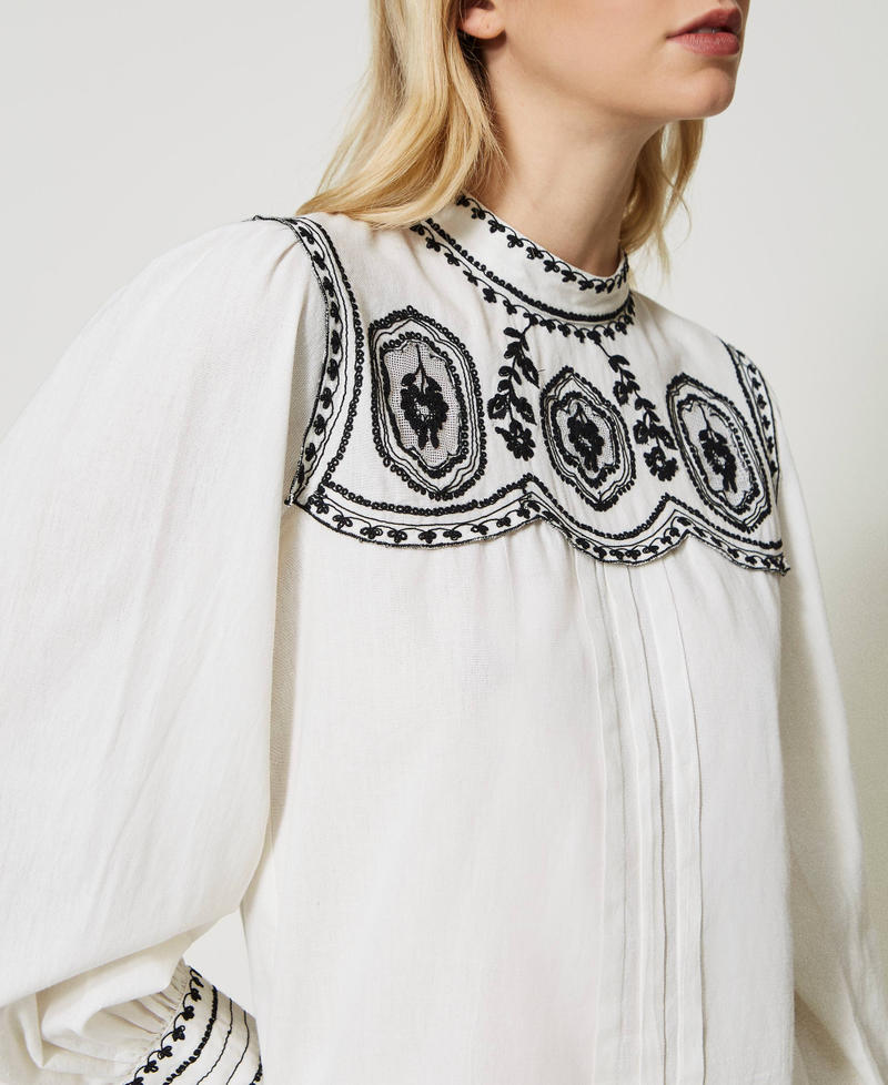 Blouse with contrasting embroideries “Snow” White / Black Embroidery Woman 231TP2492-04