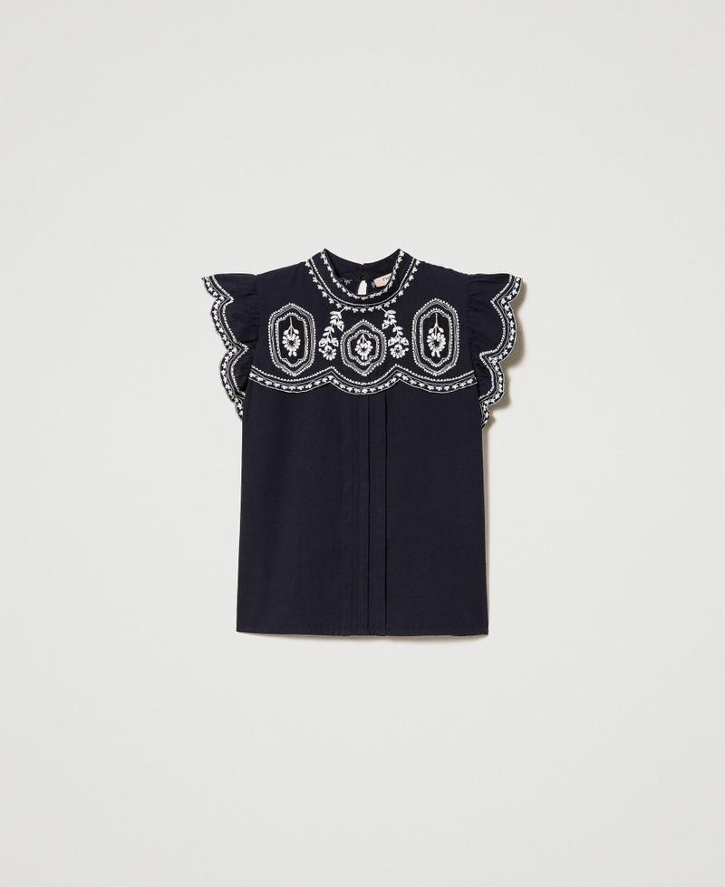 Top with contrasting embroideries