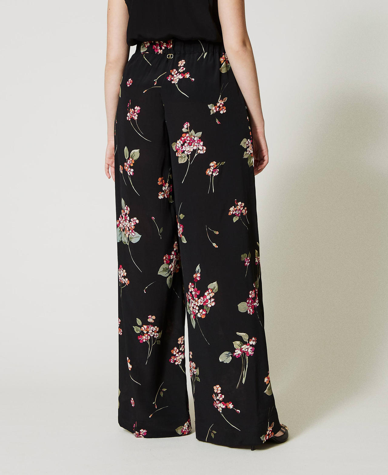 Pantaloni a palazzo in crepe a fiori Donna Nero TWINSET Milano