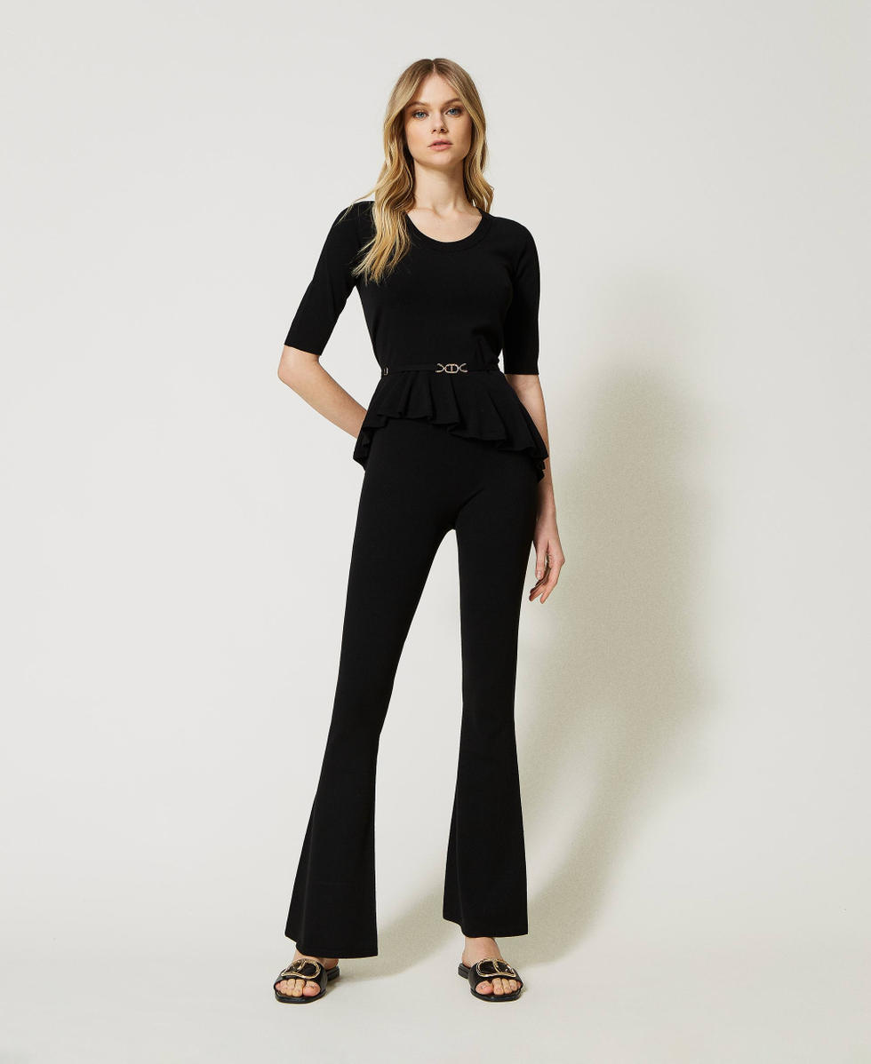 Flared seamless knit trousers
