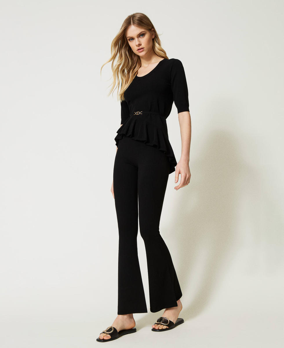Flared seamless knit trousers
