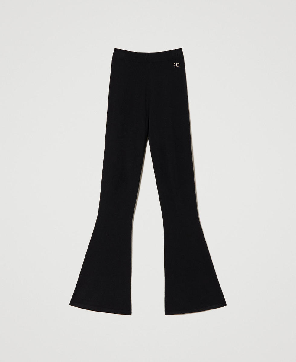 Flared seamless knit trousers