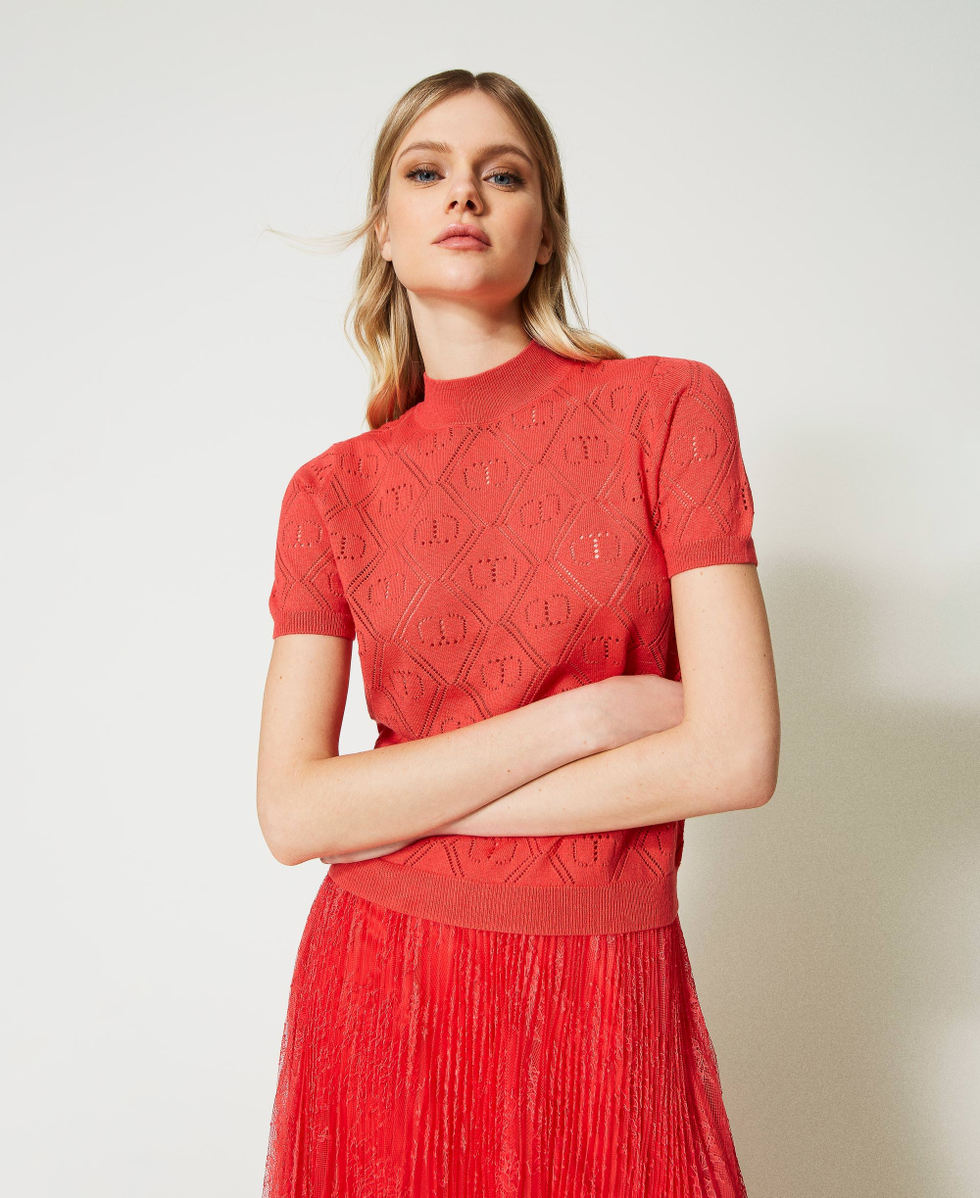 Oval T jumper with roller neck