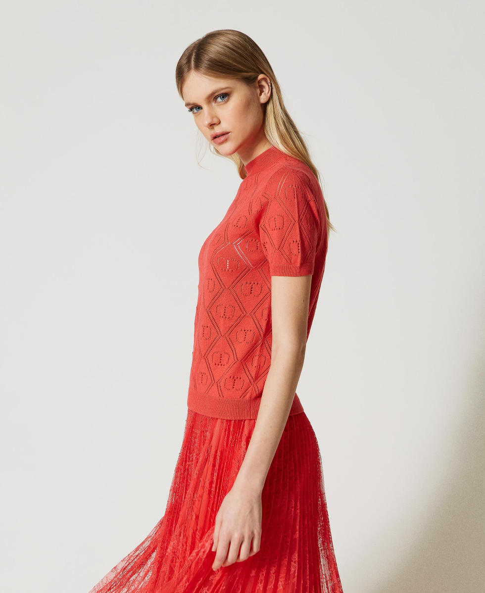 Oval T jumper with roller neck