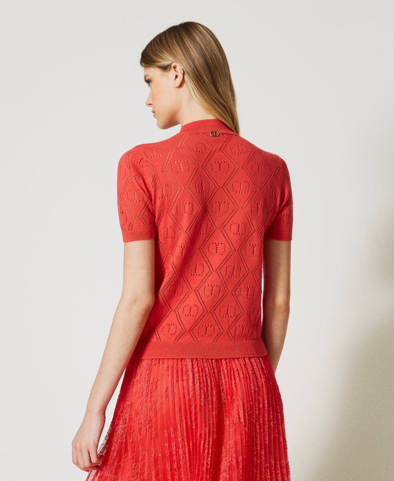 Oval T jumper with roller neck
