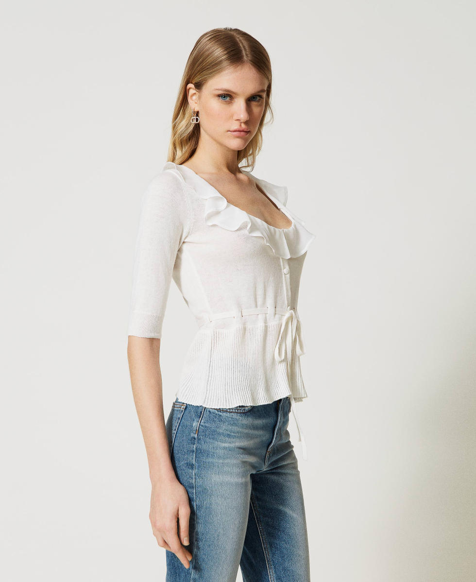 Cardigan with ruffles and drawstring