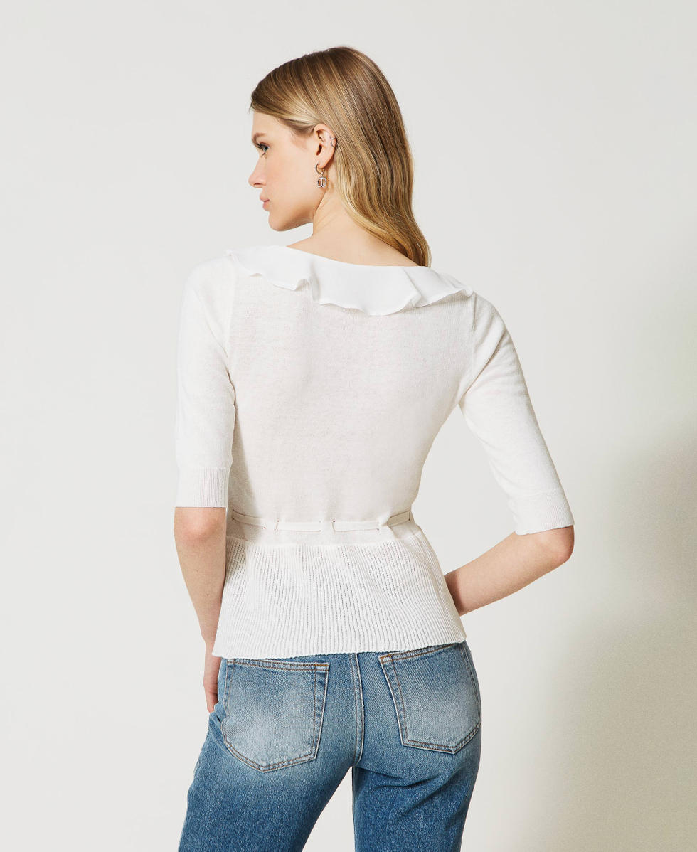 Cardigan with ruffles and drawstring