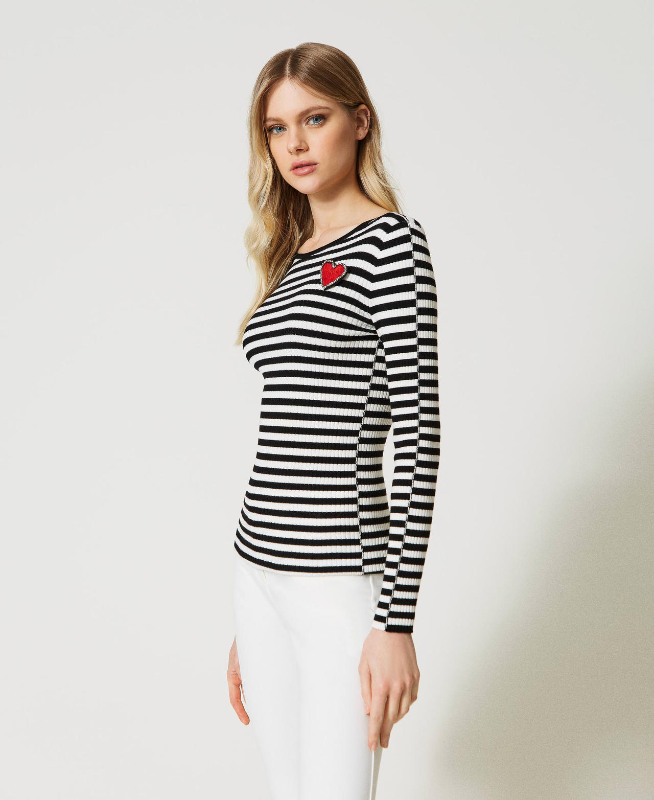 Striped top with brooch