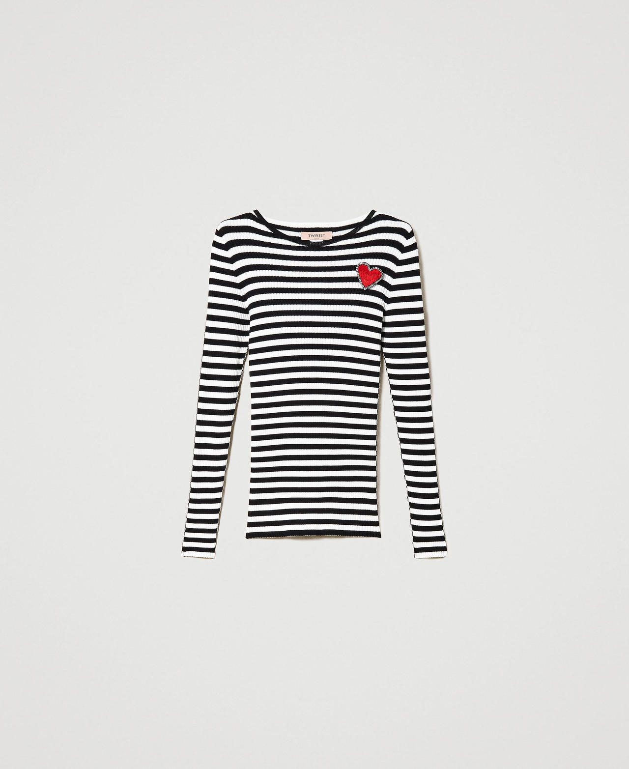 Striped top with brooch