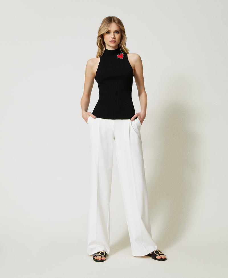 Gestreiftes Stricktop mit Brosche Schwarz Frau 231TP3291_00006_T0