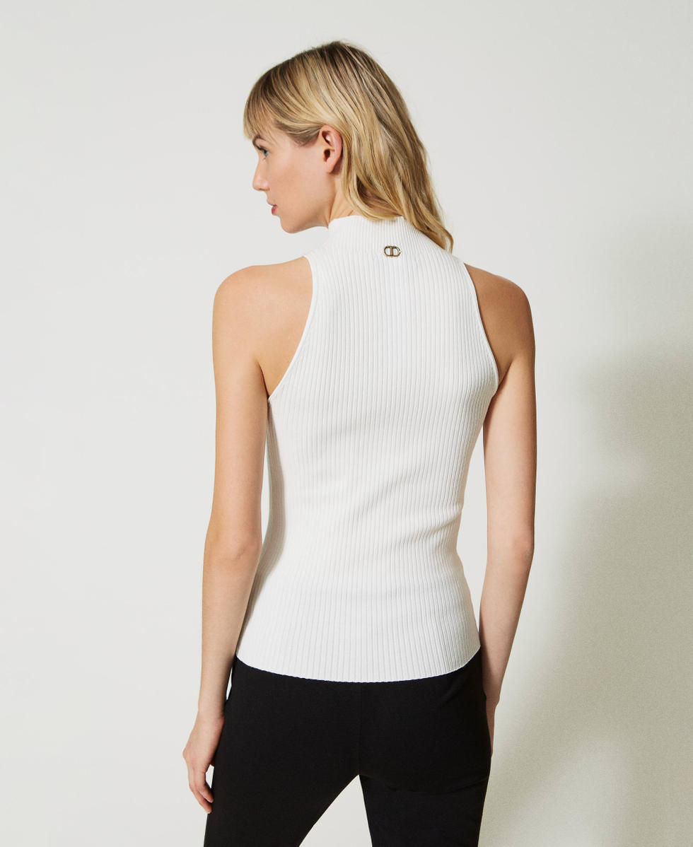 Striped top with brooch