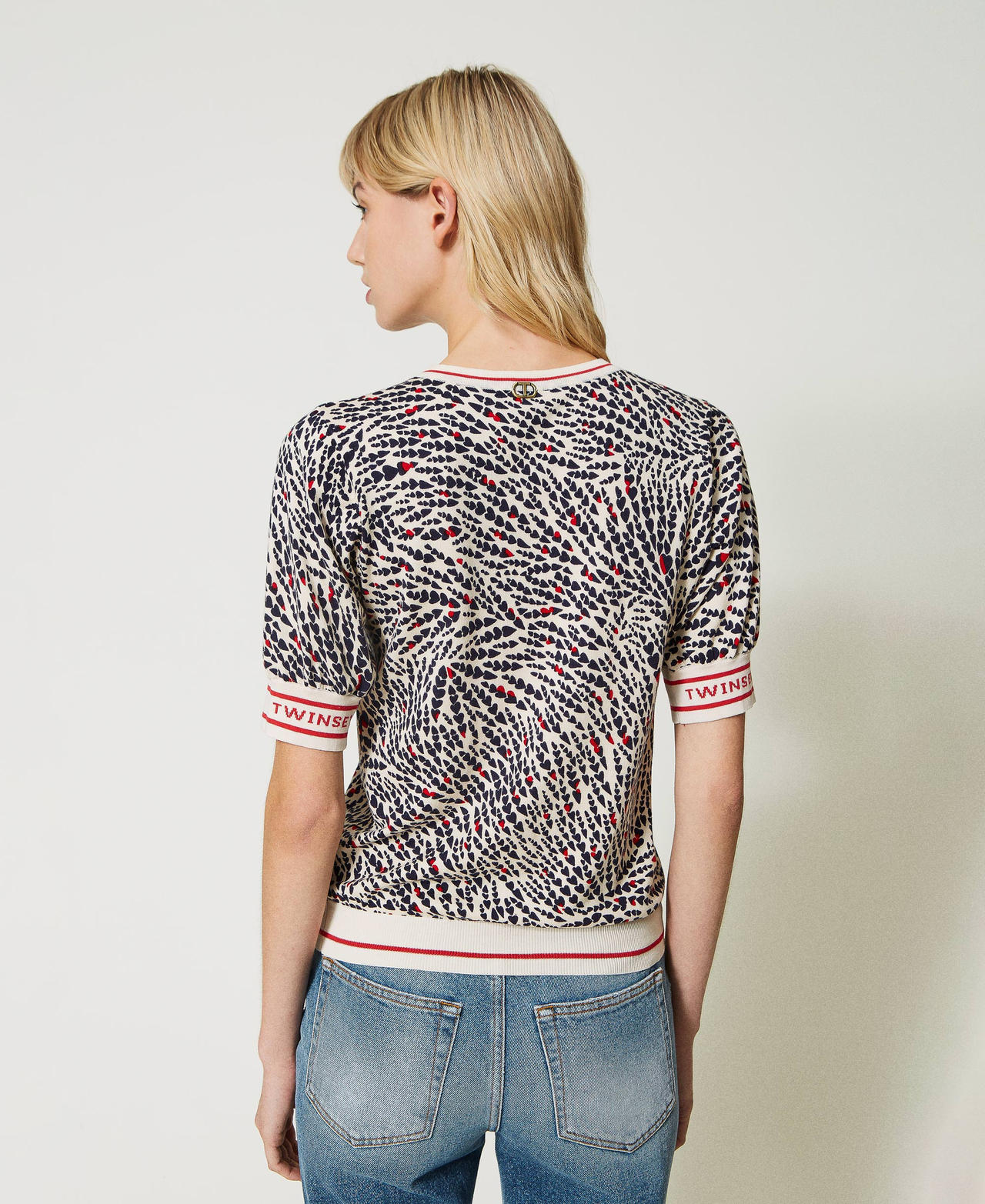 Printed jumper with jacquard logo