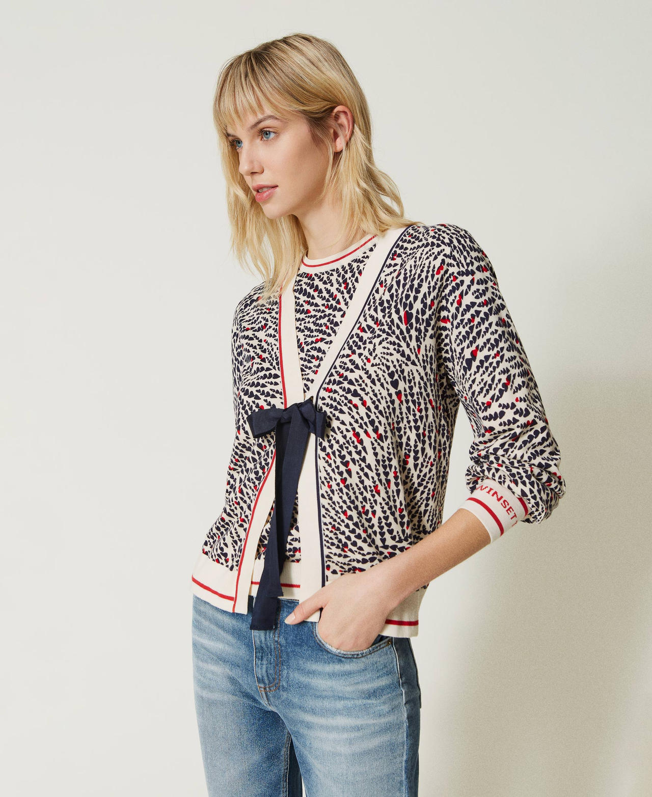 Printed jumper with jacquard logo