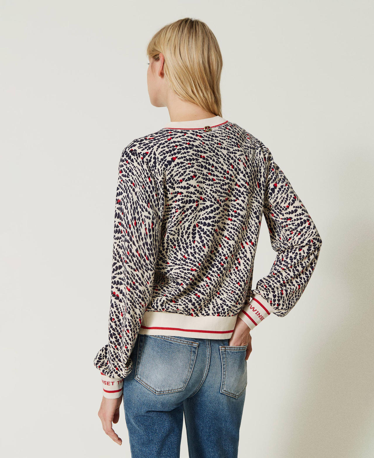 Printed jumper with jacquard logo