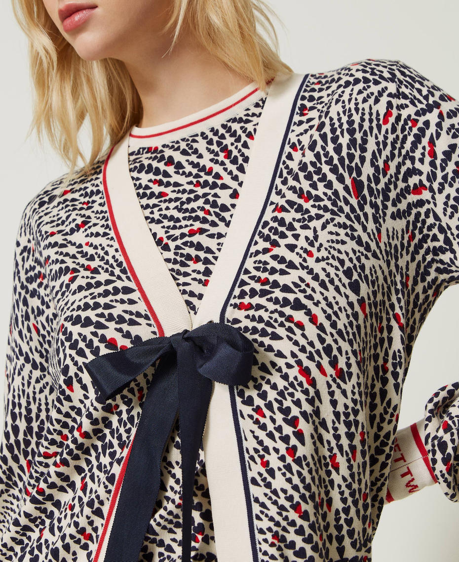 Printed jumper with jacquard logo