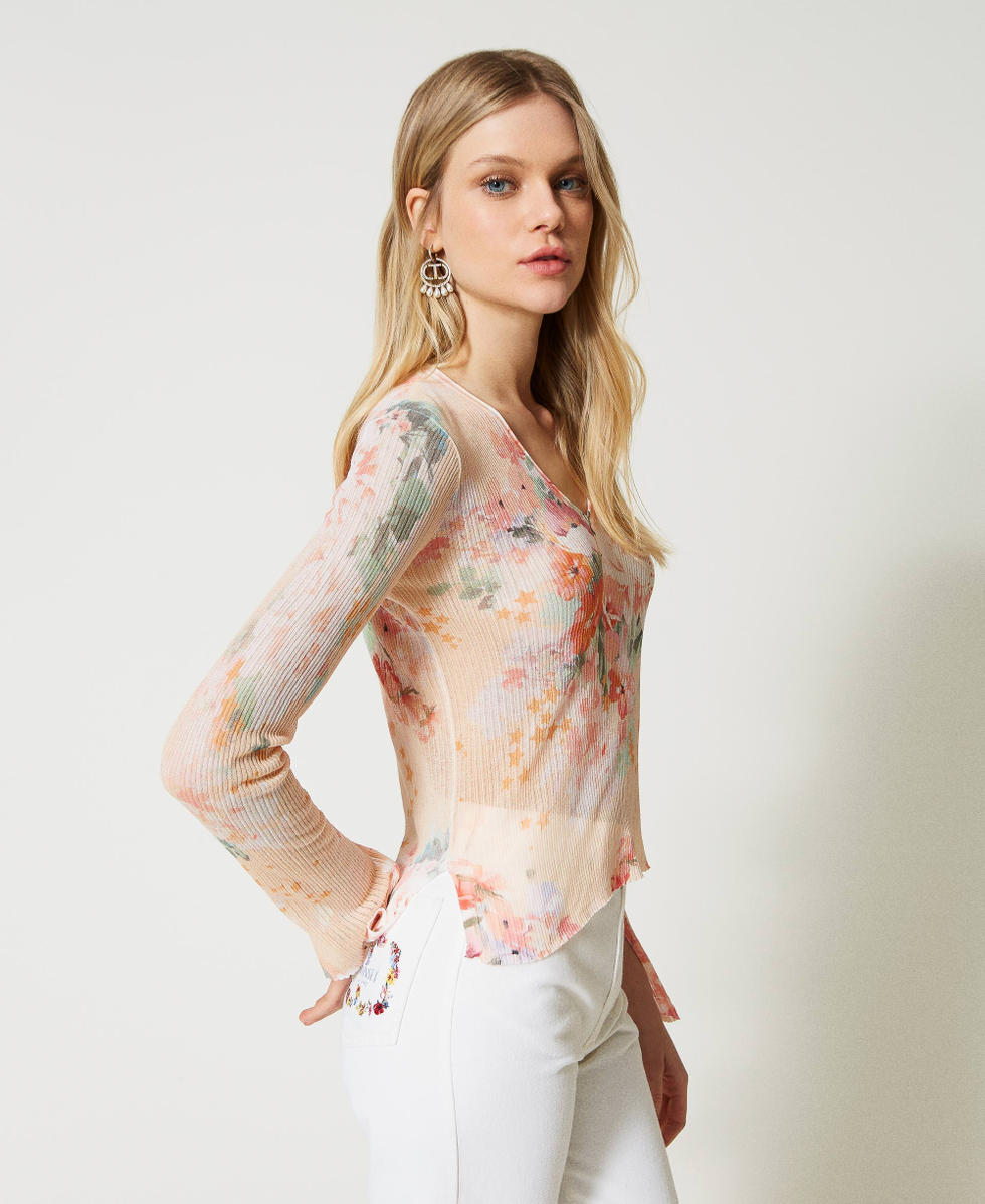 Jersey acanalado con estampado y escote de pico