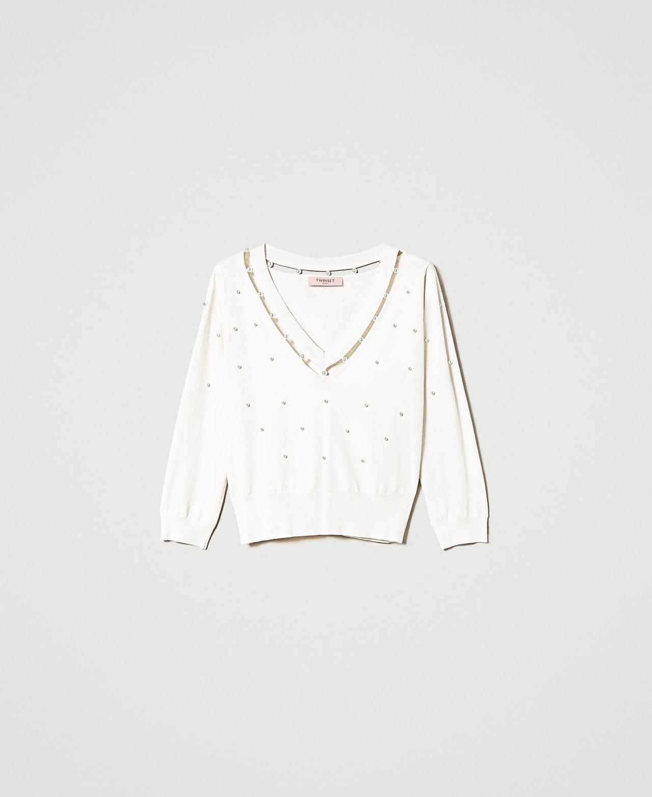 Jumper with hand-embroidered pearls