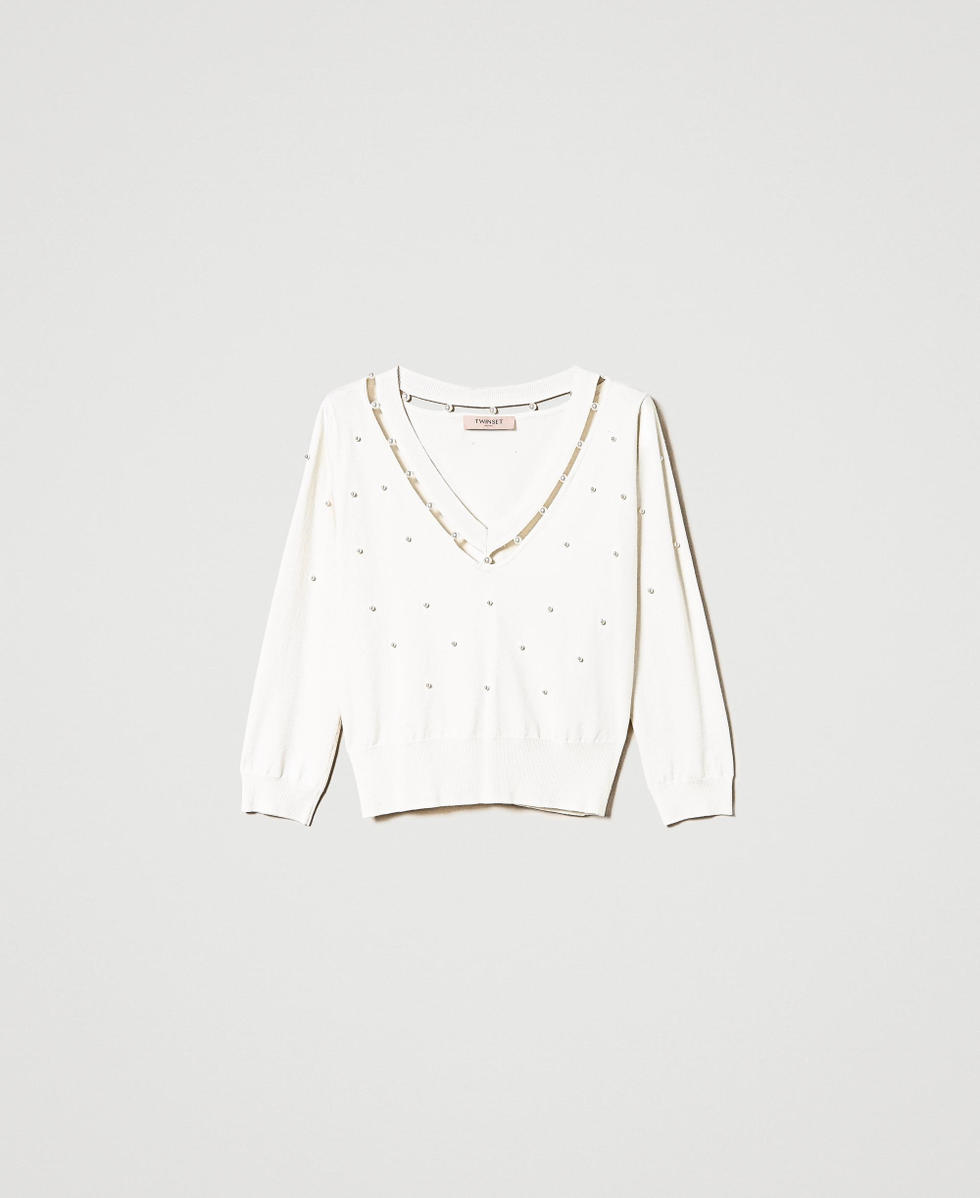 Pull avec broderie de perles r&eacute;alis&eacute;e &agrave; la main