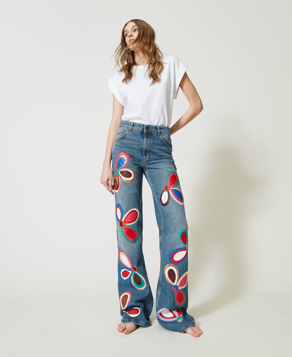Jeans flare 'Dalia' con petali effetto pelle