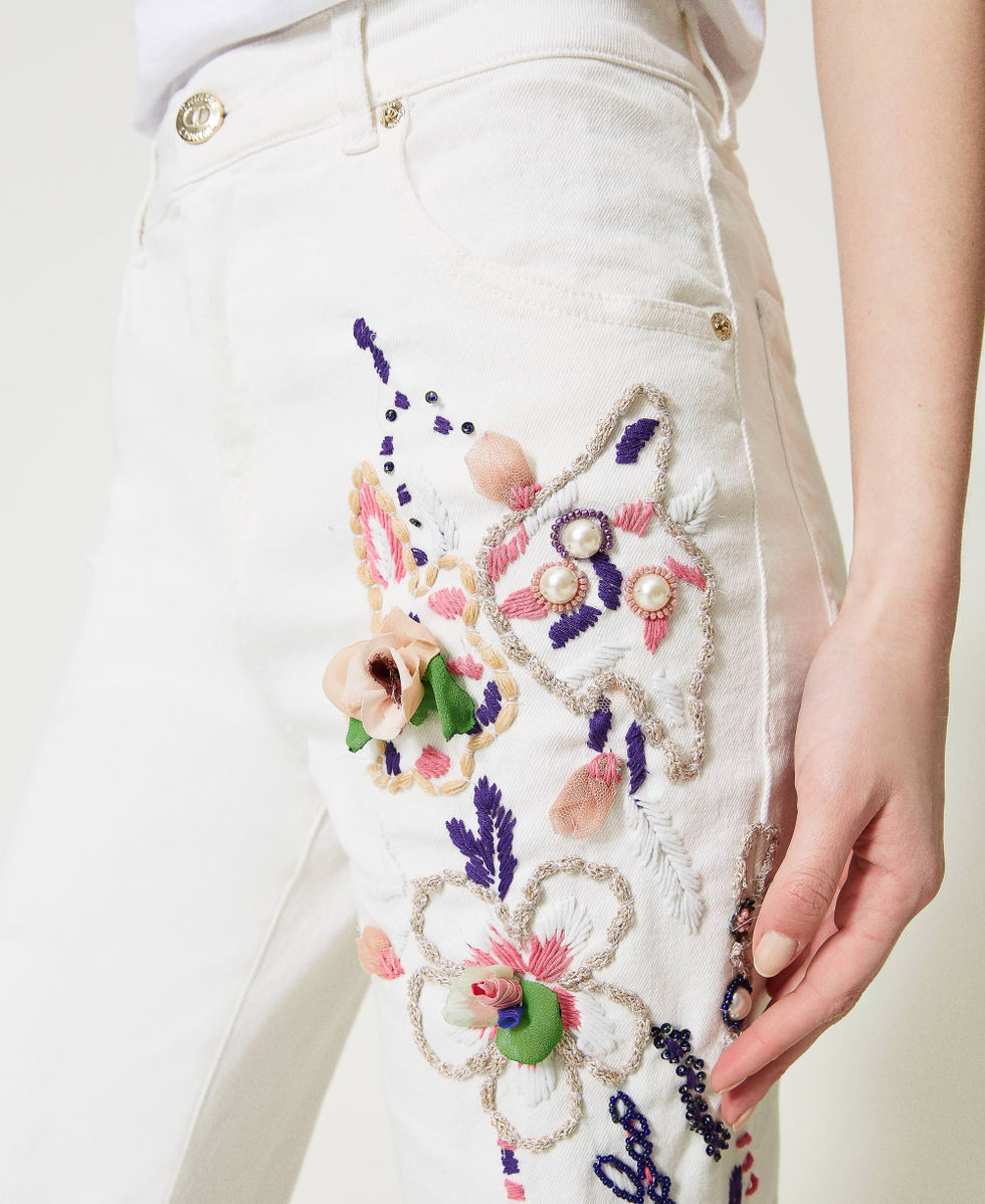 Margherita' flared bull trousers with handmade embroideries