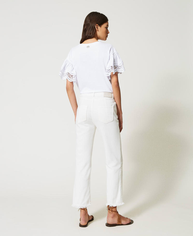 Pantalon slim en bull avec broderie anglaise