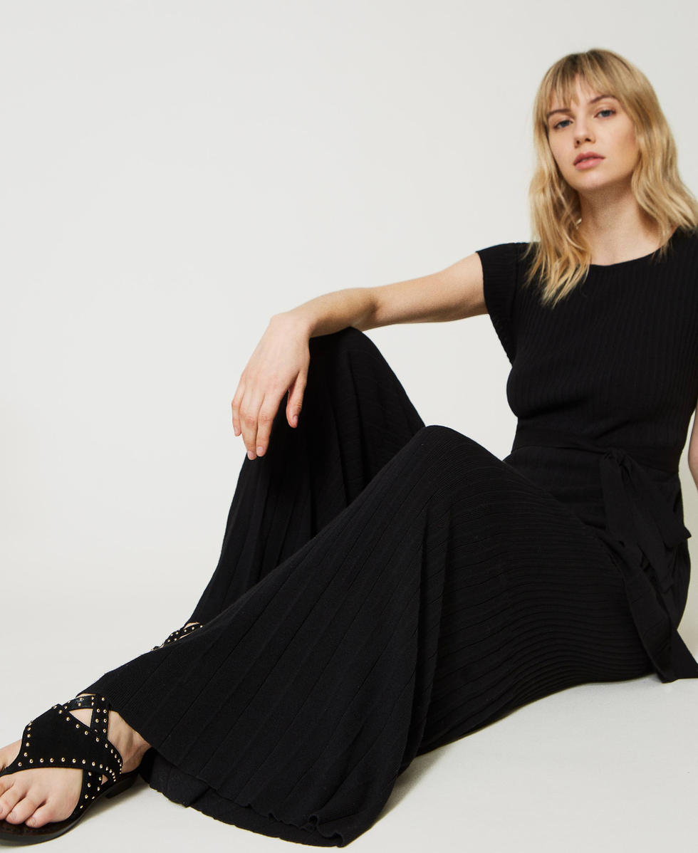 Pantalones palazzo con plisados