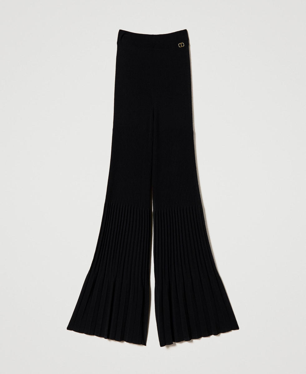 Pantalones palazzo con plisados