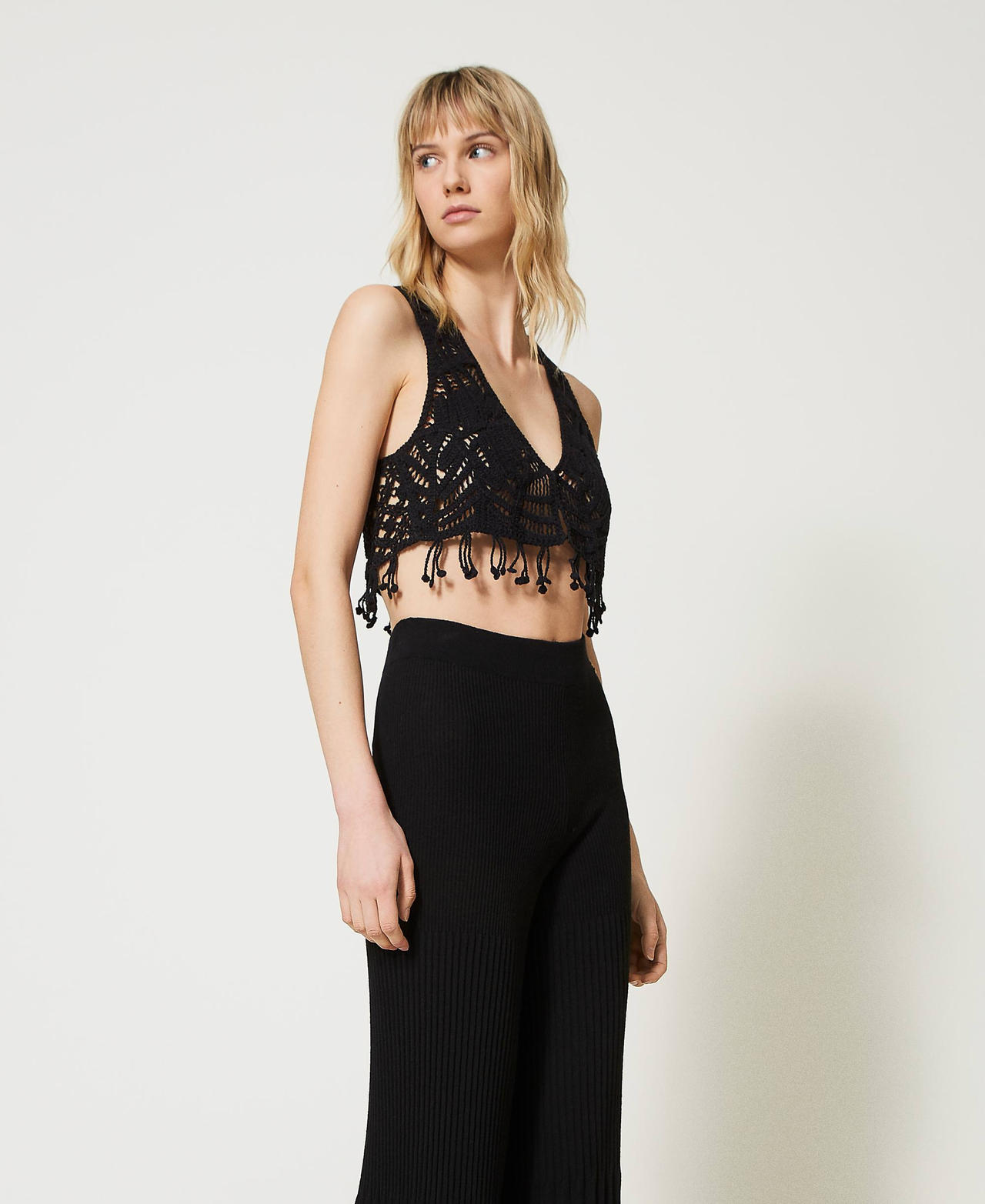 Cropped crochet waistcoat with fringes