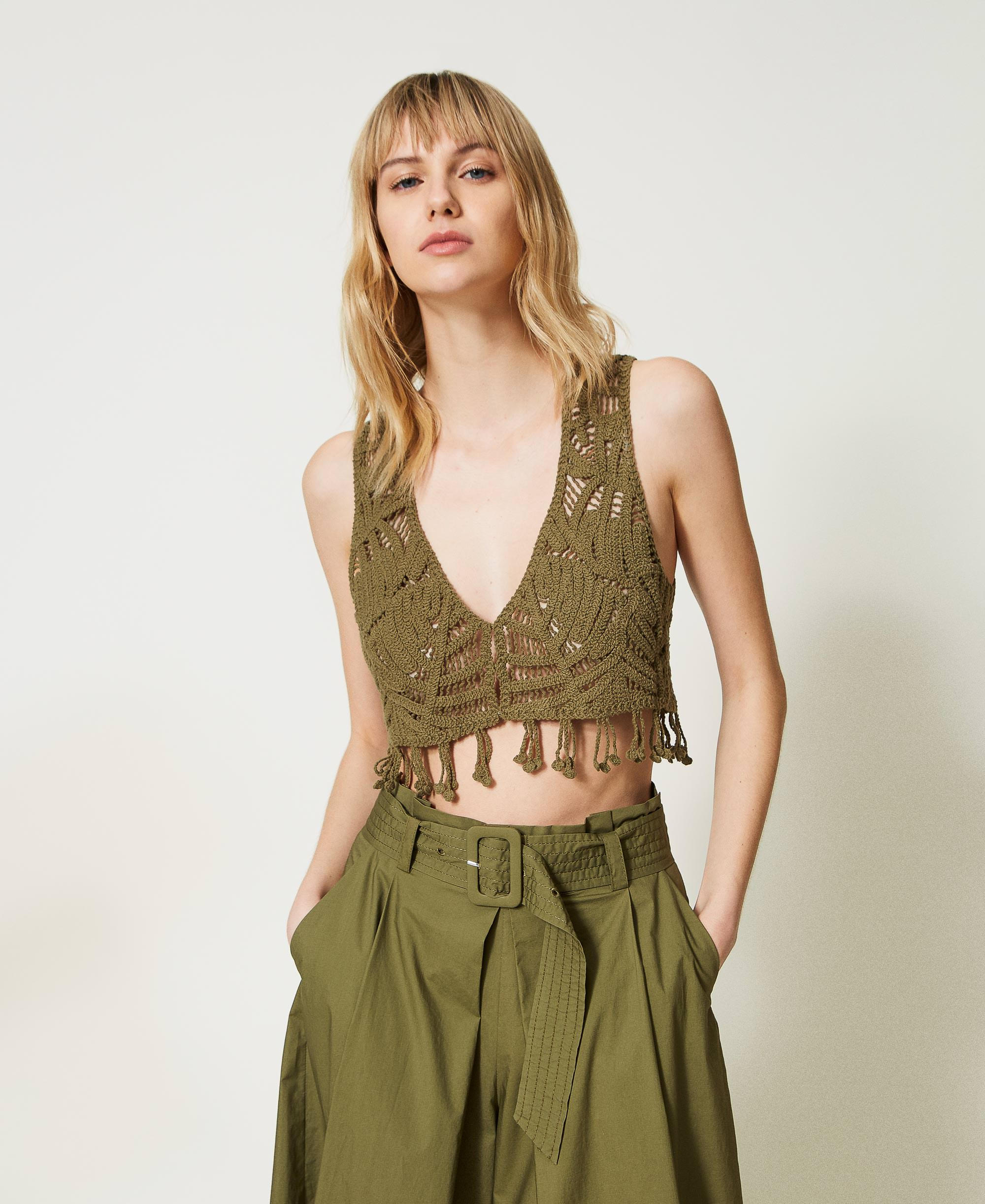 Cropped crochet waistcoat with fringes