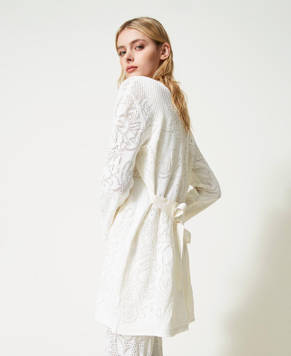 Cardigan long avec fleurs ajourées