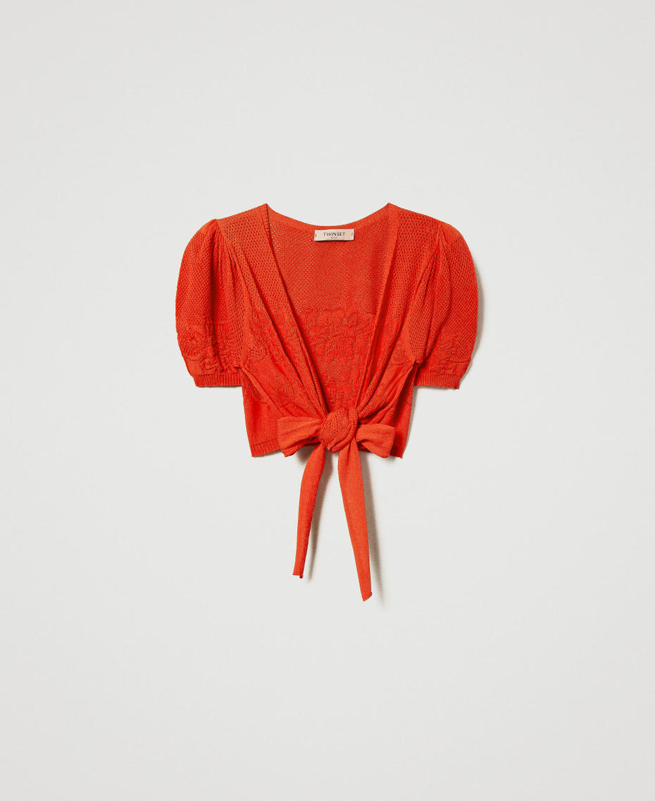 Top coprispalle con fiori traforati