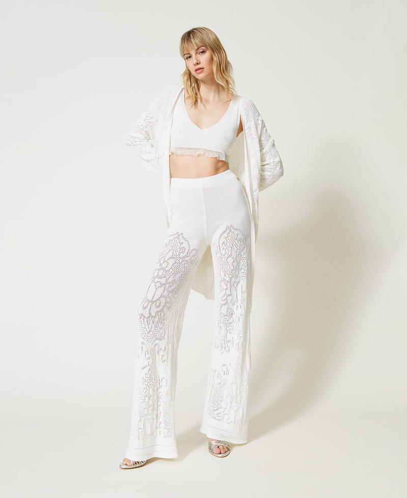 Pantalon palazzo avec fleurs ajourées