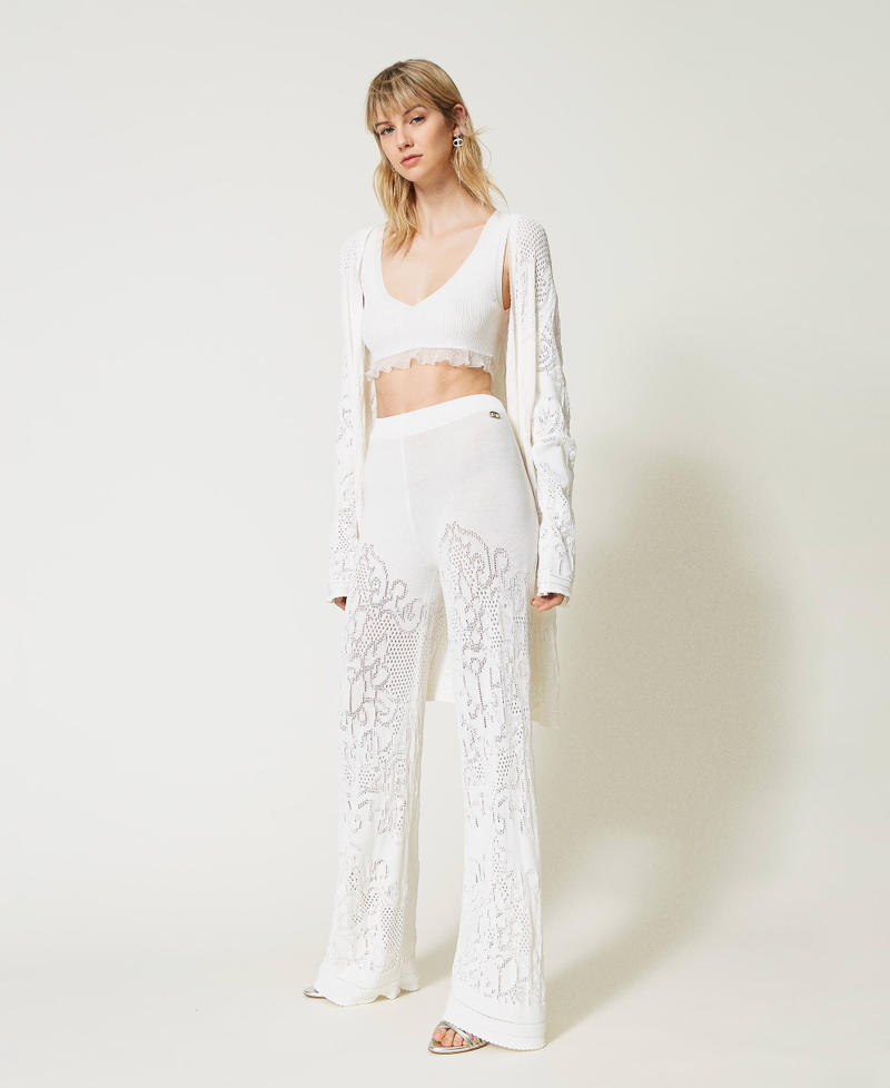 Pantalon palazzo avec fleurs ajourées