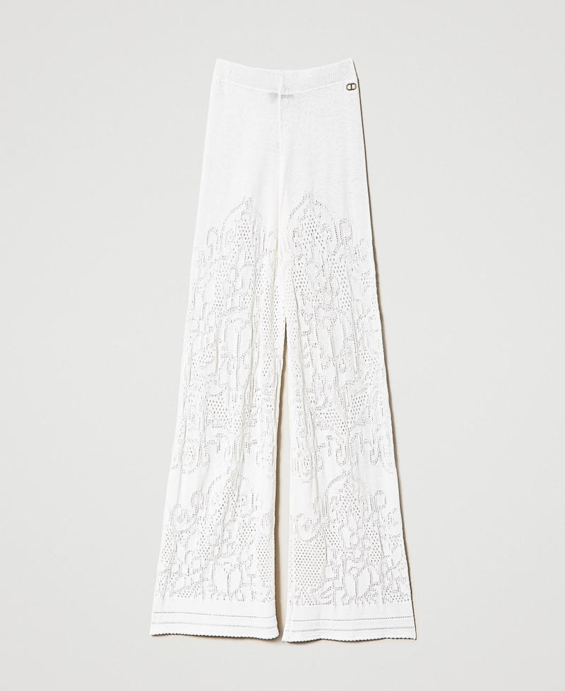 Pantalon palazzo avec fleurs ajourées