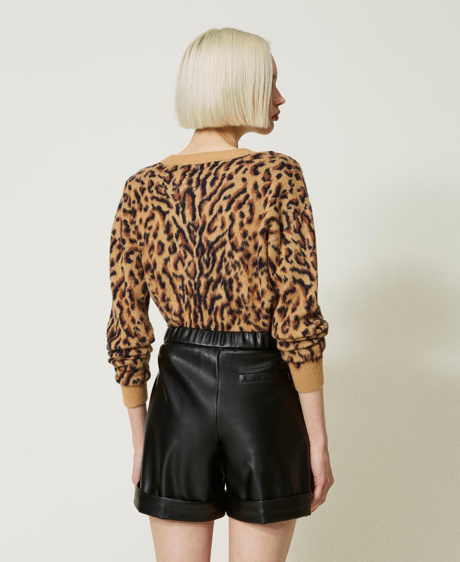 Leather-like shorts with pleats
