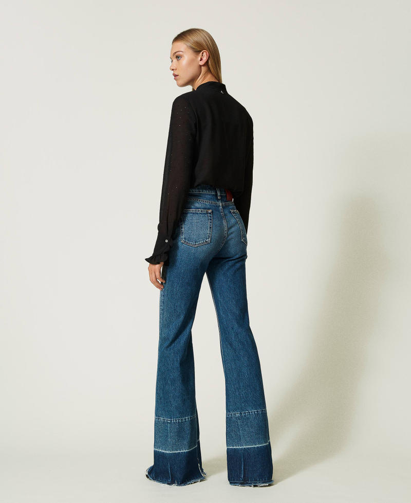 Bell bottom jeans with frayed hem Woman, Blue