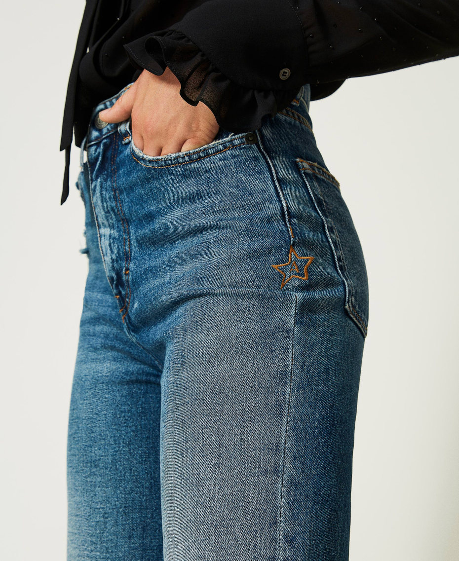 Расклешенные джинсы с бахромчатым низом Синий "Средний Деним" женщина 232AP2342-05