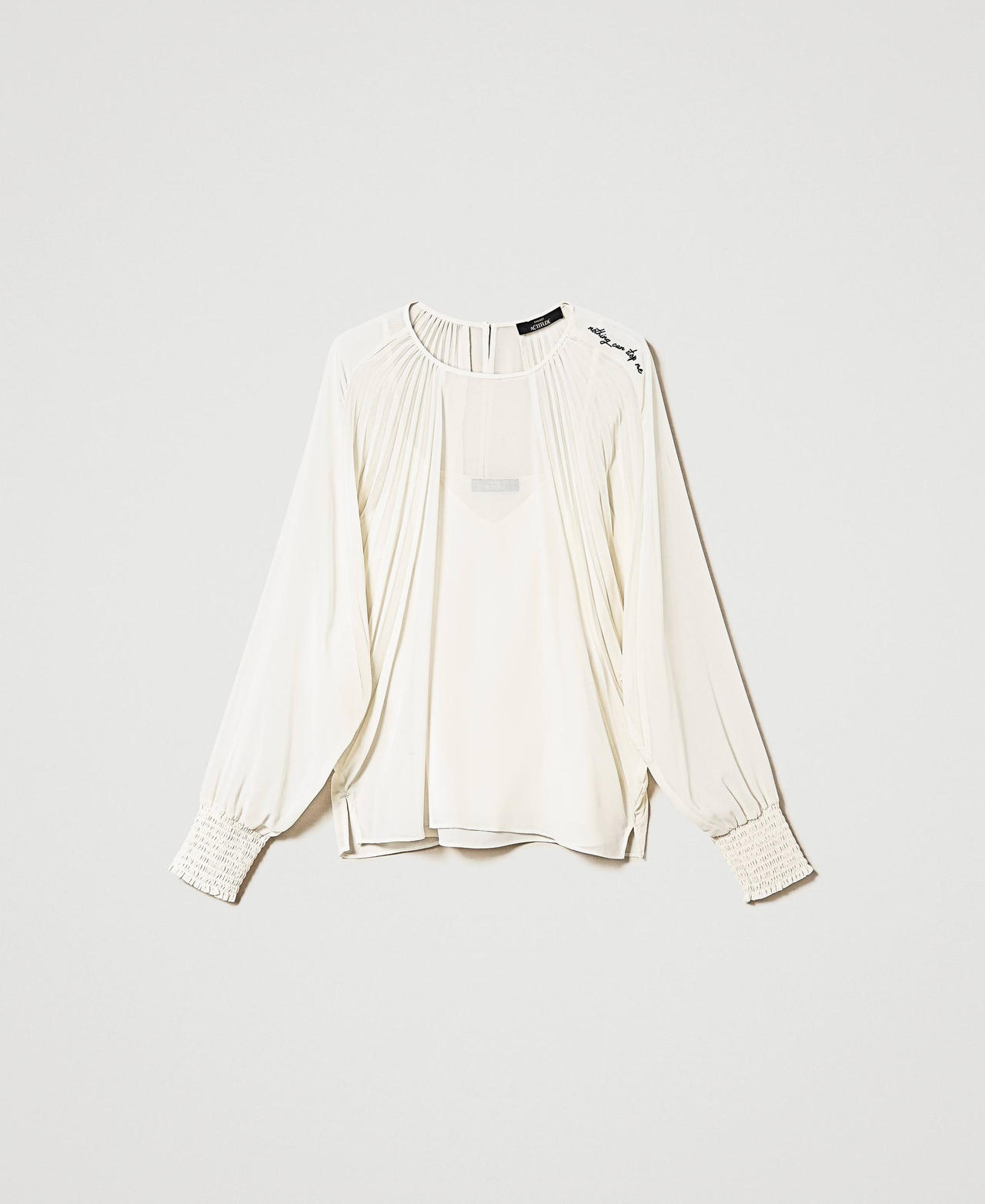 Blouse en crêpe georgette plissé