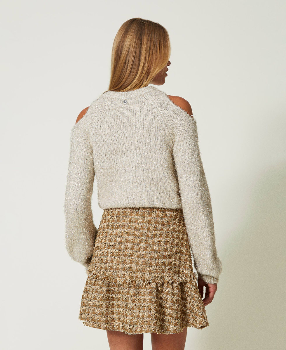 Mini-jupe en tissu boucl&eacute; avec fil lurex